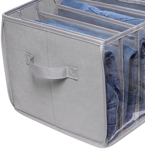 Folded clothing sorted into transparent compartments