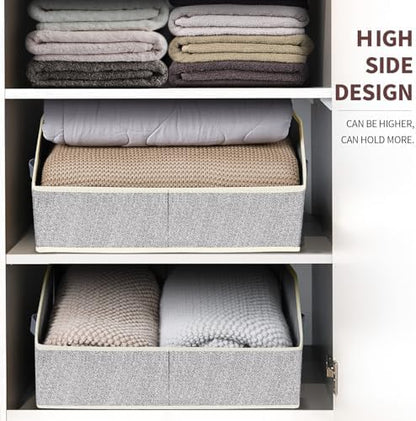 Closet bins organizing clothing and towels